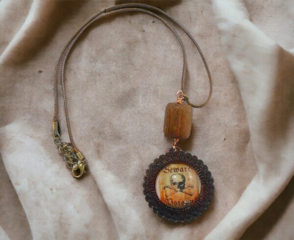 Skull Poison Pendant