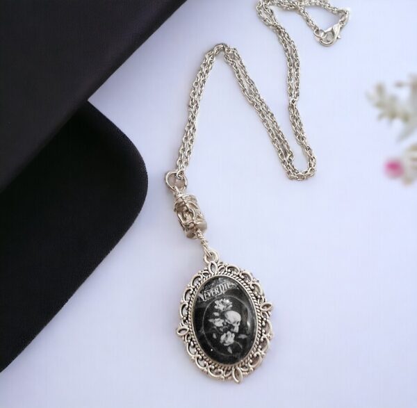 Metallic Skull Quote Pendant