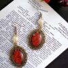 Leviathan Cross Symbol Earrings